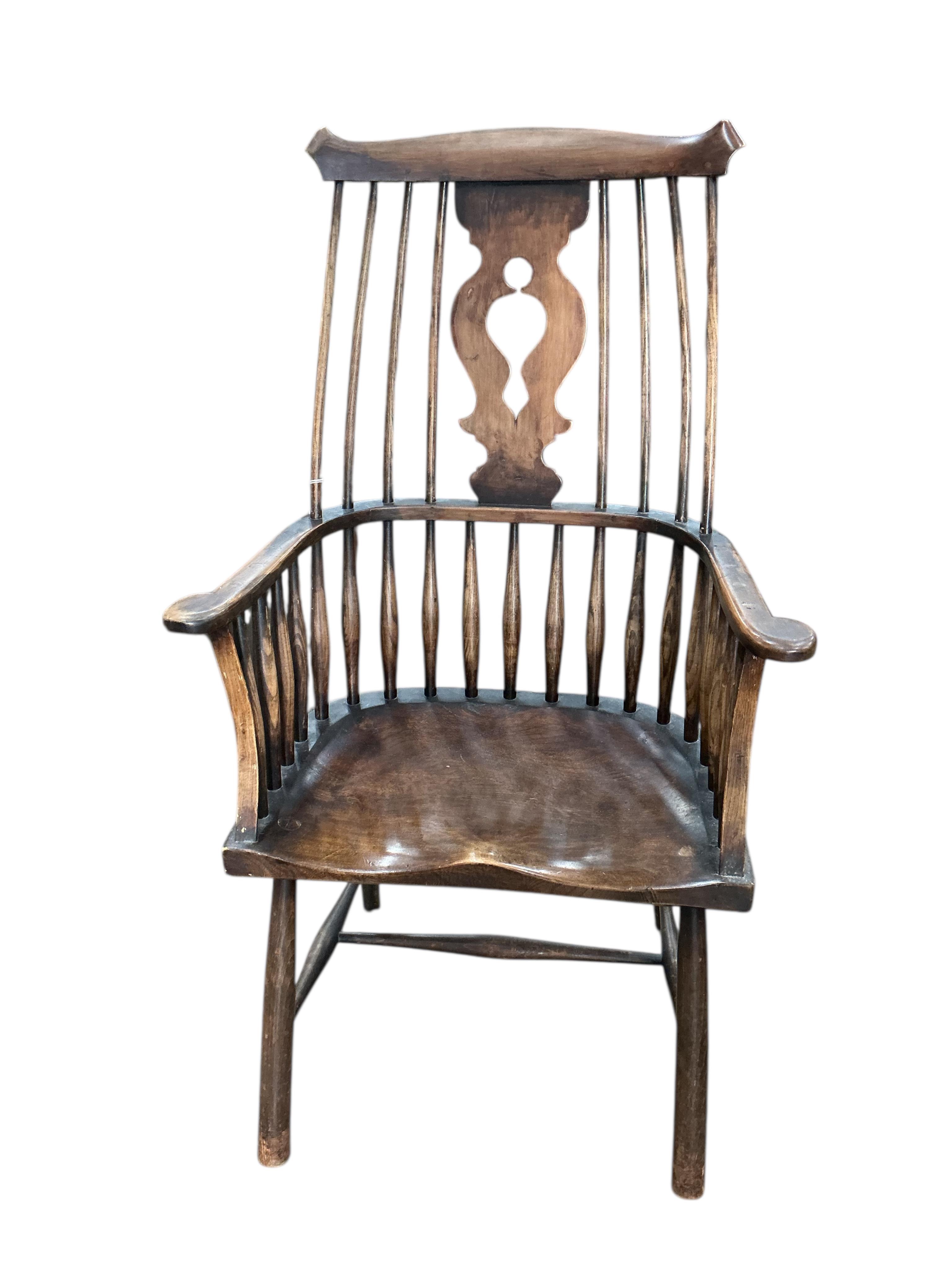 An early 20th century elm and beech Windsor armchair, width 66cm, depth 41cm, height 117cm